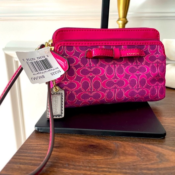 Coach Handbags - Coach Pink Wristlet Bag